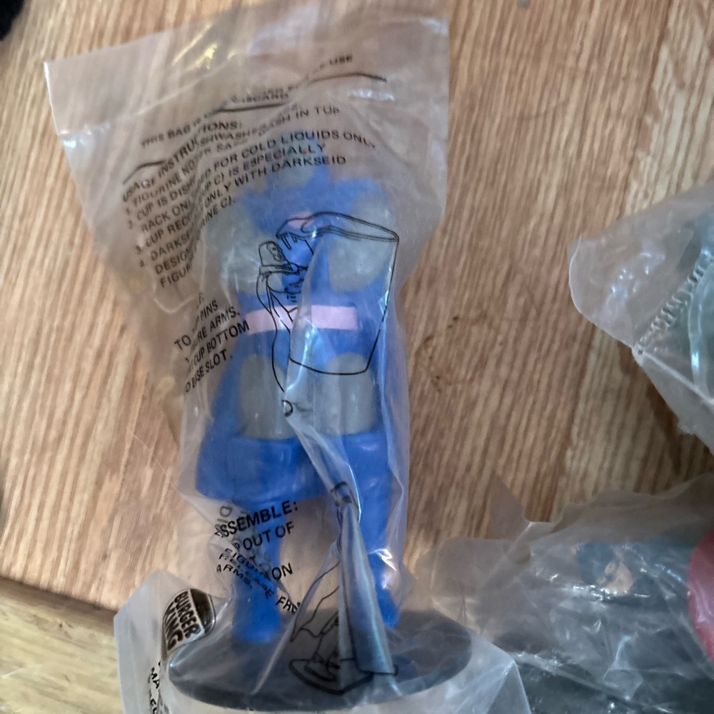 Original marvel toys still in the plastic that came from Happy meals long ago
